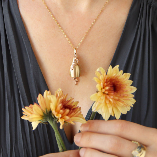 yellow and rose gold bell pendant