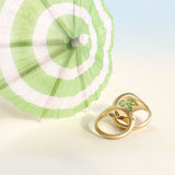 signet rings with enamel leaves on the inside