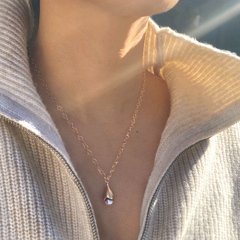 Akoya Pearl Pendant Necklace on model's neck with sunlight