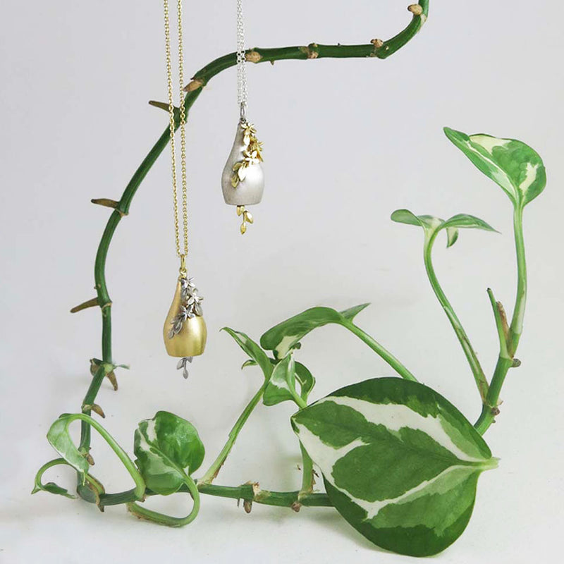 Two Bell Pendants with greenery jewelry designer Gwen Barba