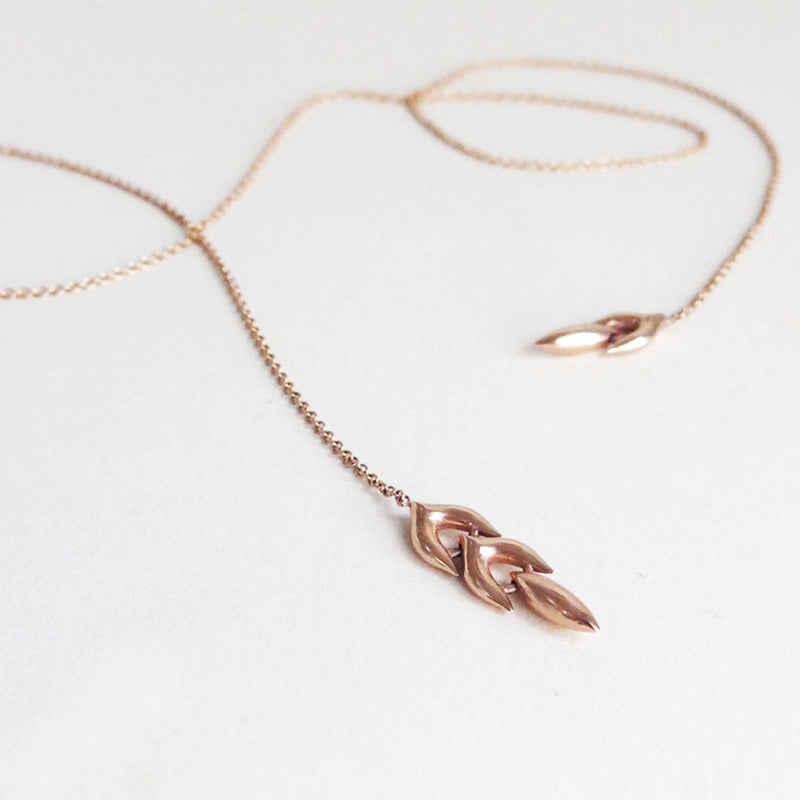 gold lariat style necklace