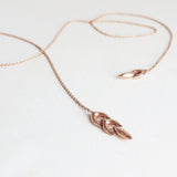 gold lariat style necklace